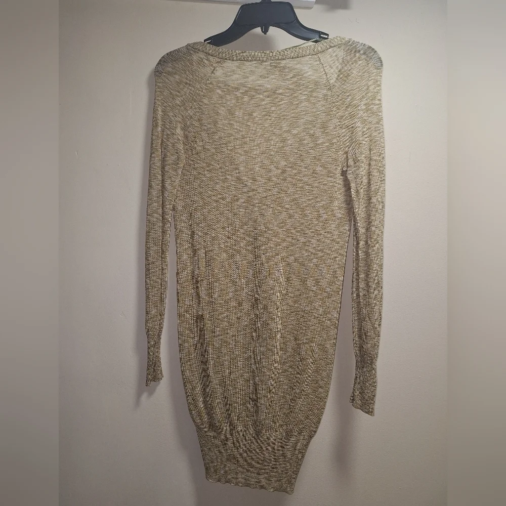 A Free People long length semi-sheer cardigan in a ladies' size XS. EUC.